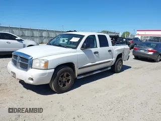 2006 Dodge Dakota SLT with VIN 1D7HE48N86S639435, listed as a IAAI auction lot 41863389 with 173,248 mi miles and . Bid and sale history available at carsss.com. Image 2.