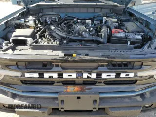 2023 Ford Bronco z VIN 1FMEE5BP6PLA96896, wystawiony jako Copart lot #50377215 z przebiegiem 29 407 mil mil oraz Szkoda całkowita • Salvage title. Historia ofert i sprzedaży dostępna na DreamBid. Obrazek 12.