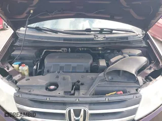 2011 Honda Odyssey Touring with VIN 5FNRL5H97BB008759, listed as a IAAI auction lot 41567010 with 215,709 mi miles. Bid and sale history available at carsss.com. Image 10.