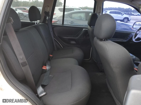 2002 Jeep Grand Cherokee Laredo with VIN 1J4GW48N02C205818, listed as a Copart auction lot 44737205 with 136,030 mi miles and Salvage Title. Bid and sale history available at carsss.com. Image 11.
