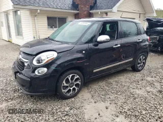 2014 FIAT 500L Lounge with VIN ZFBCFACH0EZ013324, listed as a Copart auction lot 75293764 with 73,597 mi miles and Salvage Title. Bid and sale history available at carsss.com. Image 1.
