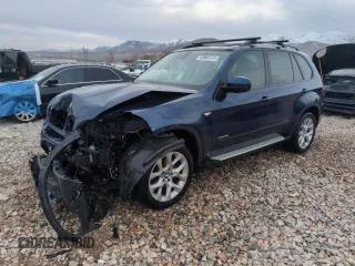2011 BMW X5 35i with VIN 5UXZV4C5XBL738928, listed as a Copart auction lot 43655315 with 127,203 mi miles and Salvage Title. Bid and sale history available at carsss.com. Image 1.
