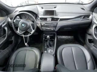 2016 BMW X1 xDrive28i z VIN WBXHT3C31GP881961, wystawiony jako Copart lot #56494955 z przebiegiem Nie podano mil oraz Tytuł czysty. Historia ofert i sprzedaży dostępna na DreamBid. Obrazek 8.