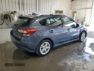 2017 Subaru Impreza Premium z VIN 4S3GTAB66H3711337, wystawiony jako Copart lot #53454715 z przebiegiem 131 102 mil mil oraz Szkoda całkowita • Salvage title. Historia ofert i sprzedaży dostępna na DreamBid. Obrazek 3.