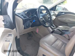 2013 Ford Escape SE with VIN 1FMCU9GXXDUB66562, listed as a IAAI auction lot 40287024 with 120,398 mi miles. Bid and sale history available at carsss.com. Image 5.