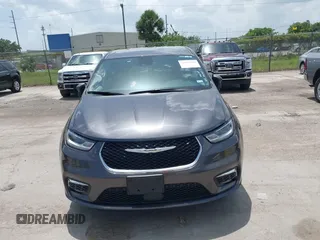 2023 Chrysler Pacifica Touring L with VIN 2C4RC1BG6PR590302, listed as a IAAI auction lot 42451369 with 72,097 mi miles and . Bid and sale history available at DreamBid. Image 6.