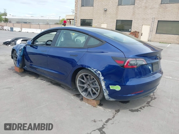 2021 Tesla Model 3 Long Range with VIN 5YJ3E1EB6MF878411, listed as a IAAI auction lot 41986947 with 71,978 mi miles and . Bid and sale history available at DreamBid. Image 3.