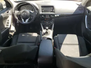 2015 Mazda CX-5 Sport z VIN JM3KE2BE3F0474927, wystawiony jako Copart lot #55444685 z przebiegiem 168 264 mil mil oraz Czysty tytuł • Clean title. Historia ofert i sprzedaży dostępna na DreamBid. Obrazek 8.