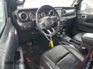 2022 Jeep Wrangler Unlimited Sahara with VIN 1C4HJXEGXNW211886, listed as a Copart auction lot 54877645 with 64,815 mi miles and Salvage title. Bid and sale history available at DreamBid. Image 8.