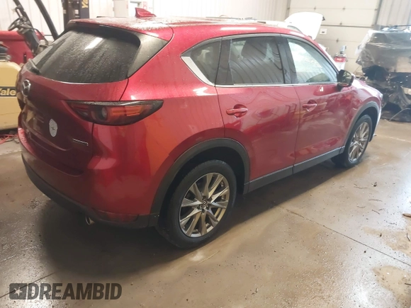 2020 Mazda CX-5 Grand Touring with VIN JM3KFBDMXL0840847, listed as a IAAI auction lot 41732185 with 36,248 mi miles. Bid and sale history available at carsss.com. Image 4.