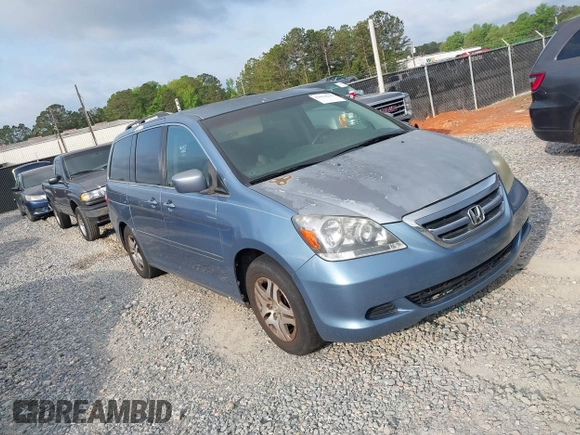 2007 Honda Odyssey EX with VIN 5FNRL38457B037239, listed as a IAAI auction lot 42034219 with 291,885 mi miles. Bid and sale history available at carsss.com. Image 1.