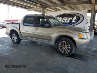 2001 Ford Explorer Sport Trac with VIN 1FMZU77E61UB89698, listed as a Copart auction lot 63945285 with 219,524 mi miles and Clean title. Bid and sale history available at DreamBid. Image 4.