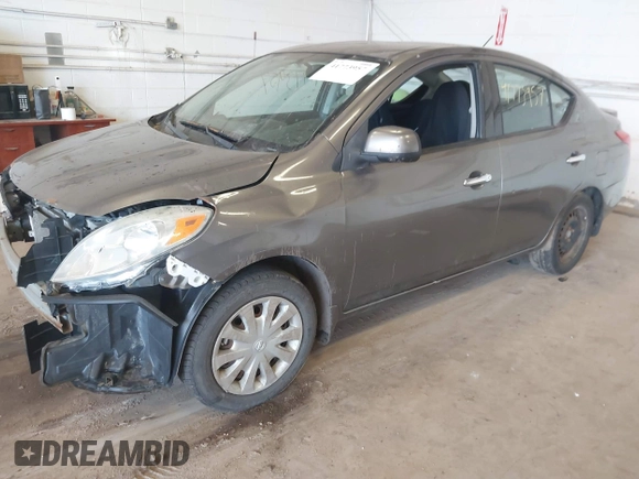 2014 Nissan Versa SV with VIN 3N1CN7AP6EL821104, listed as a IAAI auction lot 41773957 with 167,287 mi miles. Bid and sale history available at carsss.com. Image 2.