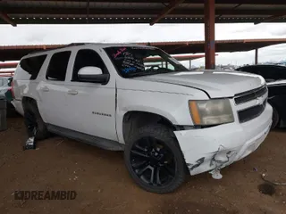 2011 Chevrolet Suburban LT with VIN 1GNSKJE31BR187475, listed as a IAAI auction lot 41799366 with 203,476 mi miles. Bid and sale history available at carsss.com. Image 1.