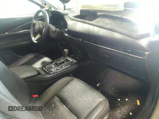 2024 Mazda CX-30 2.5 S Select Sport with VIN 3MVDMBBM0RM658069, listed as a IAAI auction lot 42130803 with 26,714 mi miles. Bid and sale history available at carsss.com. Image 5.