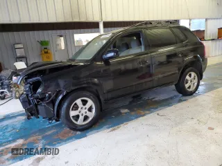 2005 Hyundai Tucson GL with VIN KM8JM12BX5U205060, listed as a Copart auction lot 71282644 with 243,076 mi miles and Salvage Title. Bid and sale history available at carsss.com. Image 1.
