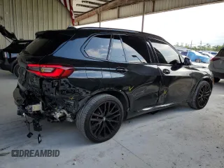 2022 BMW X5 xDrive40i with VIN 5UXCR6C0XN9M08766, listed as a Copart auction lot 51987215 with 30,997 mi miles and Salvage Title. Bid and sale history available at DreamBid. Image 3.
