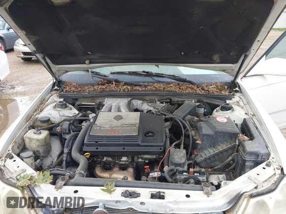 2001 Toyota Avalon XL z VIN 4T1BF28B31U182971, wystawiony jako IAAI lot #42276391 z przebiegiem 226 582 mil mil oraz . Historia ofert i sprzedaży dostępna na DreamBid. Obrazek 10.