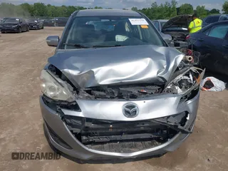 2014 Mazda 5 Sport with VIN JM1CW2BL6E0164195, listed as a IAAI auction lot 42455158 with 155,007 mi miles and . Bid and sale history available at DreamBid. Image 18.