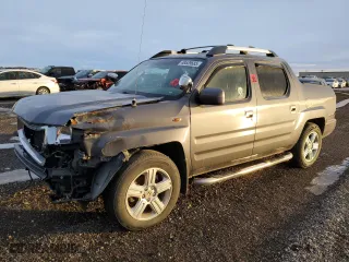 2014 Honda Ridgeline RTL with VIN 5FPYK1F50EB501251, listed as a Copart auction lot 88539685 with 0 mi miles and Salvage Title. Bid and sale history available at carsss.com. Image 1.