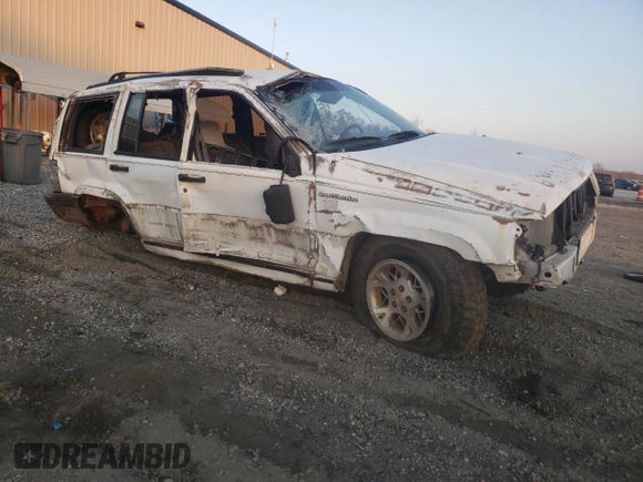 1993 Jeep Grand Cherokee Laredo with VIN 1J4GZ58Y9PC677532, listed as a Copart auction lot 44391245 with 178,772 mi miles and Salvage Title. Bid and sale history available at carsss.com. Image 4.