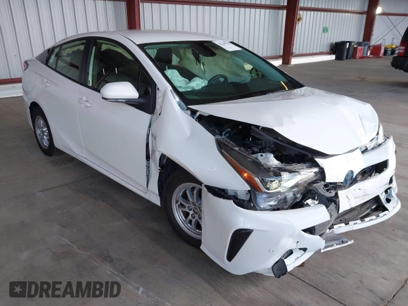 2021 Toyota Prius L Eco z VIN JTDKAMFU5M3146342, wystawiony jako IAAI lot #42249219 z przebiegiem 49 810 mil mil oraz . Historia ofert i sprzedaży dostępna na DreamBid. Obrazek 1.