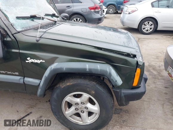 1997 Jeep Cherokee Sport with VIN 1J4FJ68SXVL582060, listed as a IAAI auction lot 41333519 with 183,580 mi miles. Bid and sale history available at carsss.com. Image 14.