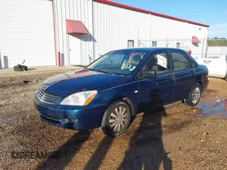 2006 Mitsubishi Lancer ES with VIN JA3AJ26E96U021297, listed as a IAAI auction lot 41462034 with 221,375 mi miles. Bid and sale history available at carsss.com. Image 2.