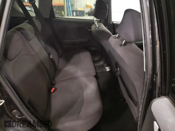 2009 Honda Fit with VIN JHMGE88259S053426, listed as a Copart auction lot 87894815 with 143,665 mi miles and Salvage Title. Bid and sale history available at carsss.com. Image 10.