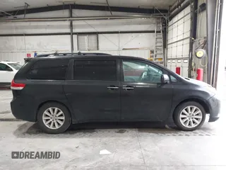 2012 Toyota Sienna XLE AAS z VIN 5TDYK3DC2CS197032, wystawiony jako IAAI lot #41942666 z przebiegiem 304 582 mil mil oraz . Historia ofert i sprzedaży dostępna na DreamBid. Obrazek 13.