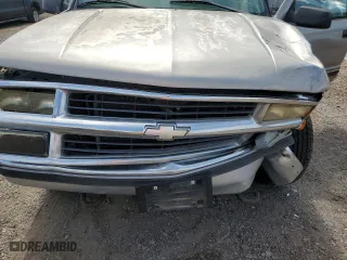 1999 Chevrolet Tahoe Z71 with VIN 1GNEK13R0XJ444734, listed as a Copart auction lot 76323384 with 160,631 mi miles and Salvage Title. Bid and sale history available at carsss.com. Image 12.