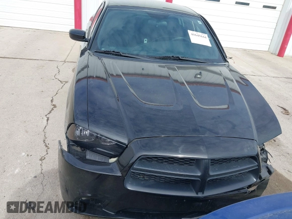 2013 Dodge Charger Police z VIN 2C3CDXAG5DH716369, wystawiony jako IAAI lot #41645644 z przebiegiem 127 535 mil mil oraz . Historia ofert i sprzedaży dostępna na DreamBid. Obrazek 12.