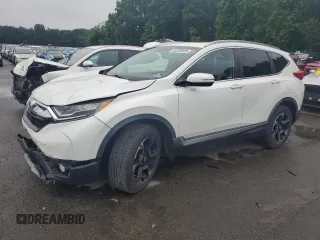 2019 Honda CR-V Touring with VIN JHLRW2H97KX000174, listed as a Copart auction lot 64205905 with 93,303 mi miles and Salvage title. Bid and sale history available at DreamBid. Image 1.