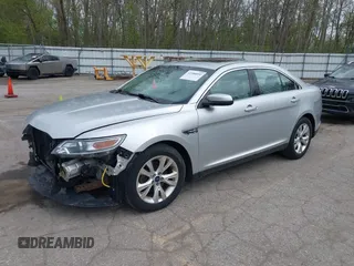 2012 Ford Taurus SEL z VIN 1FAHP2EW1CG134363, wystawiony jako IAAI lot #42180692 z przebiegiem 163 193 mil mil oraz . Historia ofert i sprzedaży dostępna na DreamBid. Obrazek 2.