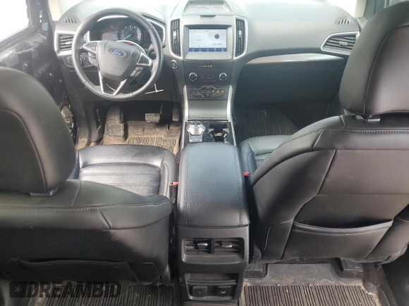 2020 Ford Edge SEL z VIN 2FMPK4J95LBB04706, wystawiony jako Copart lot #56948215 z przebiegiem 69 376 mil mil oraz Czysty tytuł • Clean title. Historia ofert i sprzedaży dostępna na DreamBid. Obrazek 8.