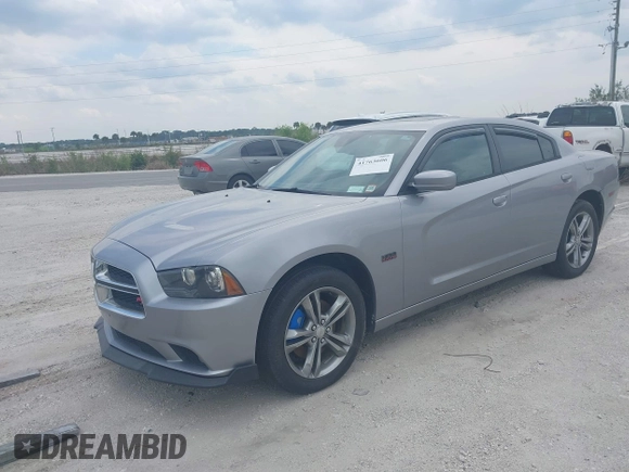 2014 Dodge Charger RT Plus with VIN 2C3CDXDT7EH159703, listed as a IAAI auction lot 41763606 with 132,333 mi miles. Bid and sale history available at carsss.com. Image 2.