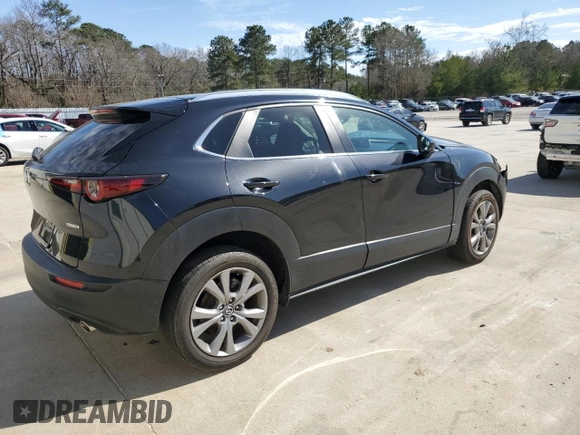 2023 Mazda CX-30 S Carbon Edition with VIN 3MVDMBCM4PM527285, listed as a Copart auction lot 47938225 with 29,650 mi miles and Salvage title. Bid and sale history available at DreamBid. Image 3.