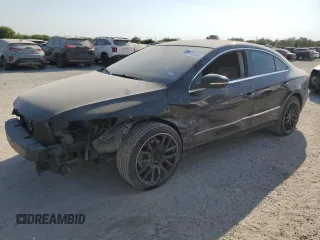 2014 Volkswagen CC R-Line with VIN WVWBN7AN7EE537598, listed as a Copart auction lot 73974244 with 139,476 mi miles and Salvage Title. Bid and sale history available at carsss.com. Image 1.