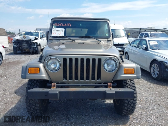 2004 Jeep Wrangler Sport with VIN 1J4FA49SX4P774167, listed as a IAAI auction lot 42686834 with 170,731 mi miles and . Bid and sale history available at DreamBid. Image 12.