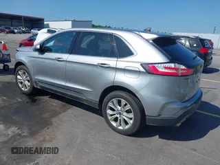 2021 Ford Edge Titanium with VIN 2FMPK3K97MBA15391, listed as a IAAI auction lot 42711656 with 40,723 mi miles and . Bid and sale history available at DreamBid. Image 3.