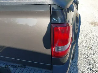 2007 Ford Explorer Sport Trac XLT z VIN 1FMEU31K67UA18559, wystawiony jako IAAI lot #40156484 z przebiegiem 245 853 mil mil oraz . Historia ofert i sprzedaży dostępna na DreamBid. Obrazek 13.