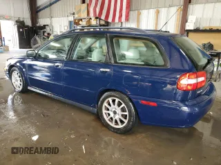 2003 Volvo V40 z VIN YV1VW27533F988646, wystawiony jako Copart lot #76371774 z przebiegiem 154 126 mil mil oraz Tytuł czysty. Historia ofert i sprzedaży dostępna na DreamBid. Obrazek 2.