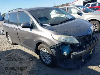 2014 Toyota Sienna XLE with VIN 5TDYK3DC7ES429112, listed as a IAAI auction lot 41764287 with 227,319 mi miles. Bid and sale history available at carsss.com. Image 1.