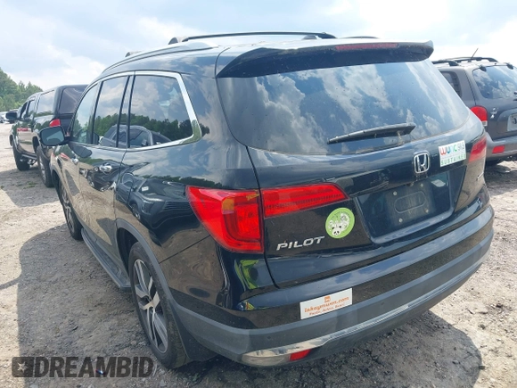 2017 Honda Pilot Touring with VIN 5FNYF5H99HB037126, listed as a IAAI auction lot 42275048 with 164,289 mi miles and . Bid and sale history available at DreamBid. Image 3.