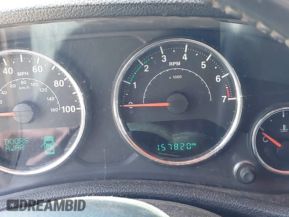 2014 Jeep Wrangler Unlimited Sport with VIN 1C4BJWDG4EL292421, listed as a IAAI auction lot 42034343 with 157,820 mi miles. Bid and sale history available at carsss.com. Image 7.