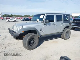 2007 Jeep Wrangler Unlimited X with VIN 1J4GB39147L199367, listed as a IAAI auction lot 40897772 with 229,309 mi miles and . Bid and sale history available at DreamBid. Image 2.