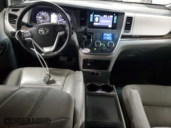 2015 Toyota Sienna XLE с VIN 5TDYK3DC4FS650605, выставлен на аукционе Copart как лот 58217575 с пробегом 174 364 миль миль и Списание • Salvage title. История ставок и продаж доступна на DreamBid. Изображение 8.