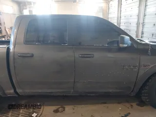 2018 Ram 1500 Rebel with VIN 1C6RR7YT1JS234777, listed as a IAAI auction lot 41409525 with 119,497 mi miles. Bid and sale history available at carsss.com. Image 13.