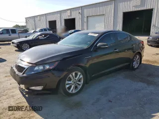 2011 Kia Optima EX z VIN KNAGN4A79B5183789, wystawiony jako Copart lot #59018985 z przebiegiem 203 137 mil mil oraz Szkoda całkowita • Salvage title. Historia ofert i sprzedaży dostępna na DreamBid. Obrazek 1.