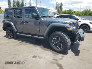 2023 Jeep Wrangler Rubicon z VIN 1C4JJXR65PW557849, wystawiony jako Copart lot #57845705 z przebiegiem 21 849 mil mil oraz Szkoda całkowita • Salvage title. Historia ofert i sprzedaży dostępna na DreamBid. Obrazek 4.